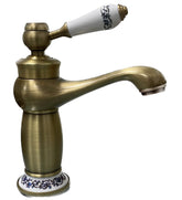 Mélangeur de lavabo de salle de bain vieux laiton avec détails en céramique vintage